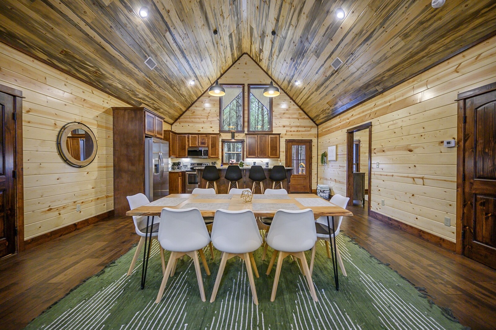 Emerald Escape open-concept dining area beside the kitchen