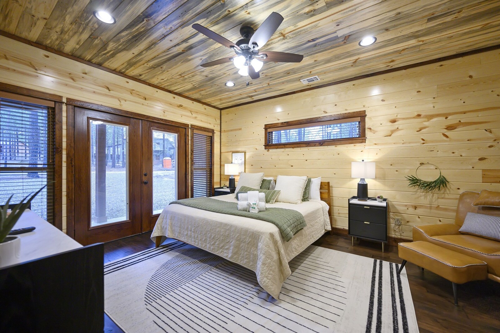 Emerald Escape king suite with nightstands and reading chair