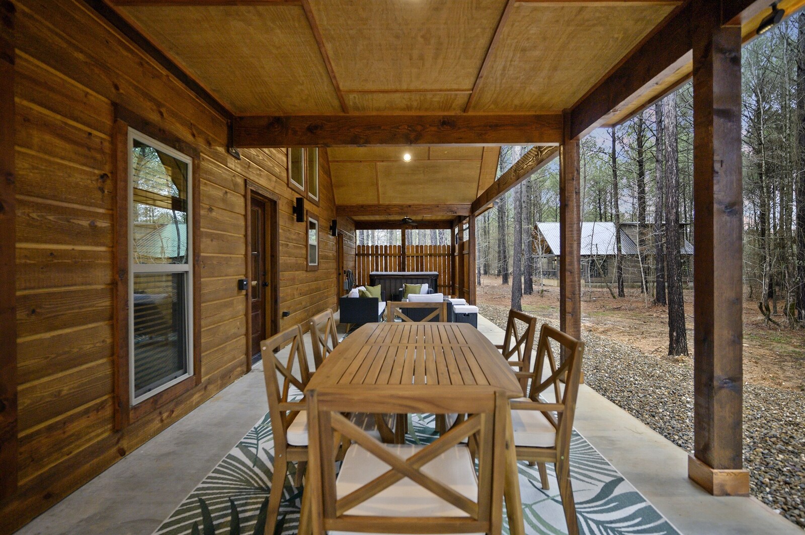 Emerald Escape outdoor dining table on the covered patio