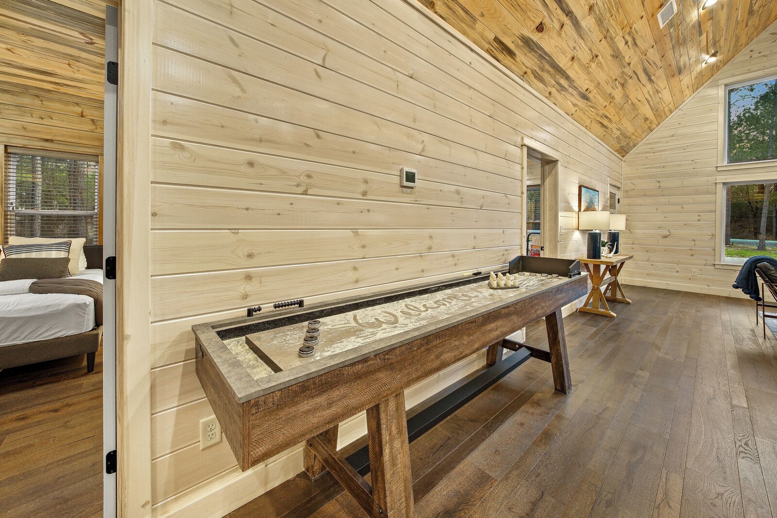 Game room with indoor shuffleboard table
