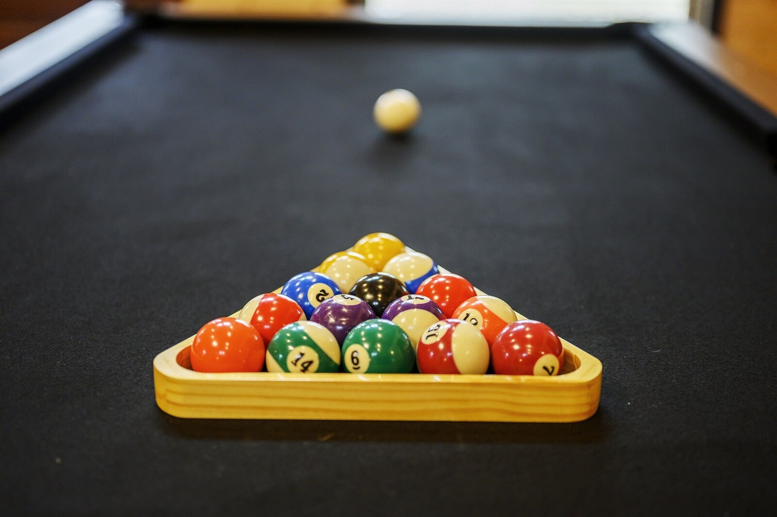 Pool table racked and ready at Emerald Escape