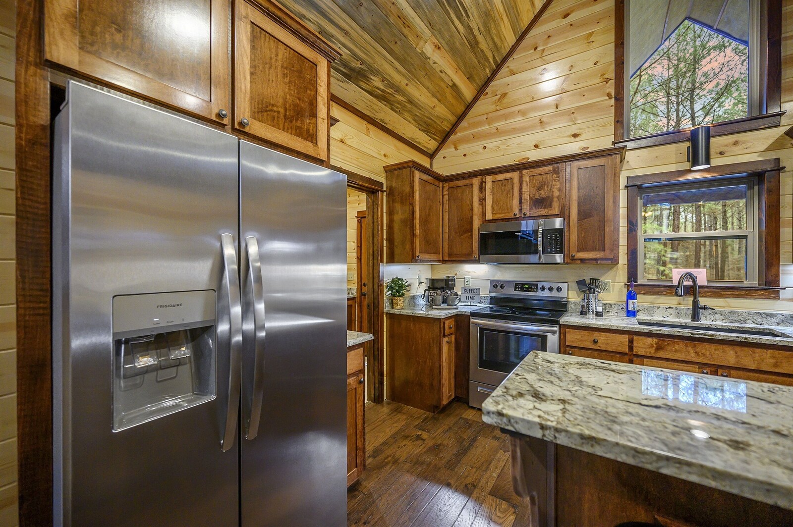 Emerald Escape kitchen with granite counters and stainless appliances