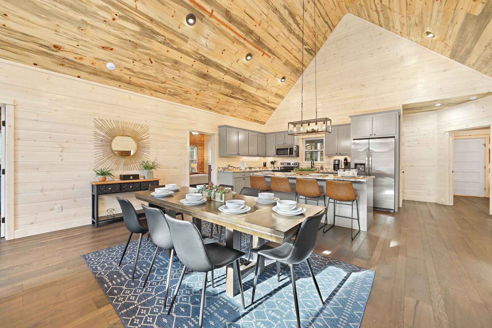 Kitchen and dining area with wooden ceilings and built-in oven